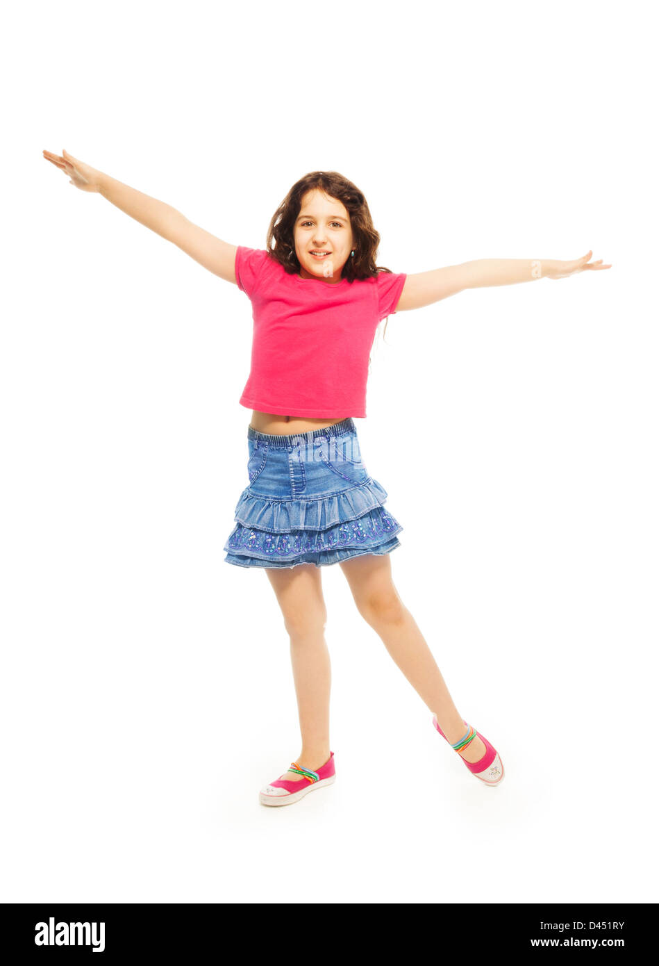 Portrait Of Happy 11 Years Old Girl With Curly Hair Jumping And