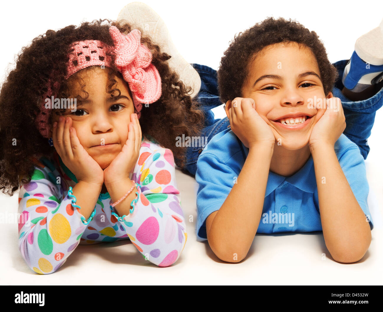 Beautiful black brother and sister with big happy smile laying on the floor  Stock Photo - Alamy