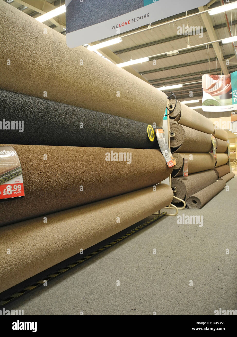 Interior of a carpet store this is Carpetright Stock Photo