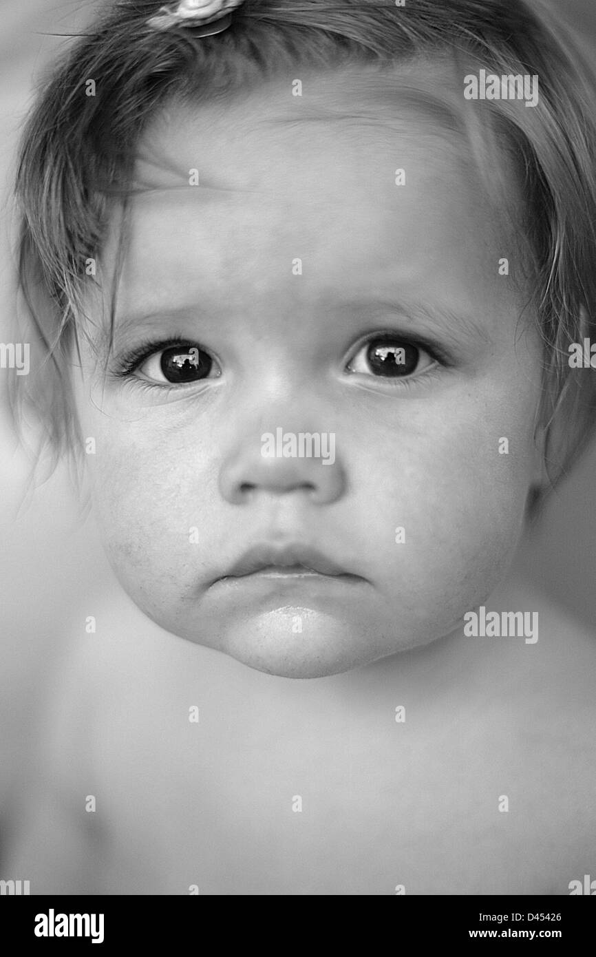 Portrait of unhappy toddler, black and white Stock Photo - Alamy