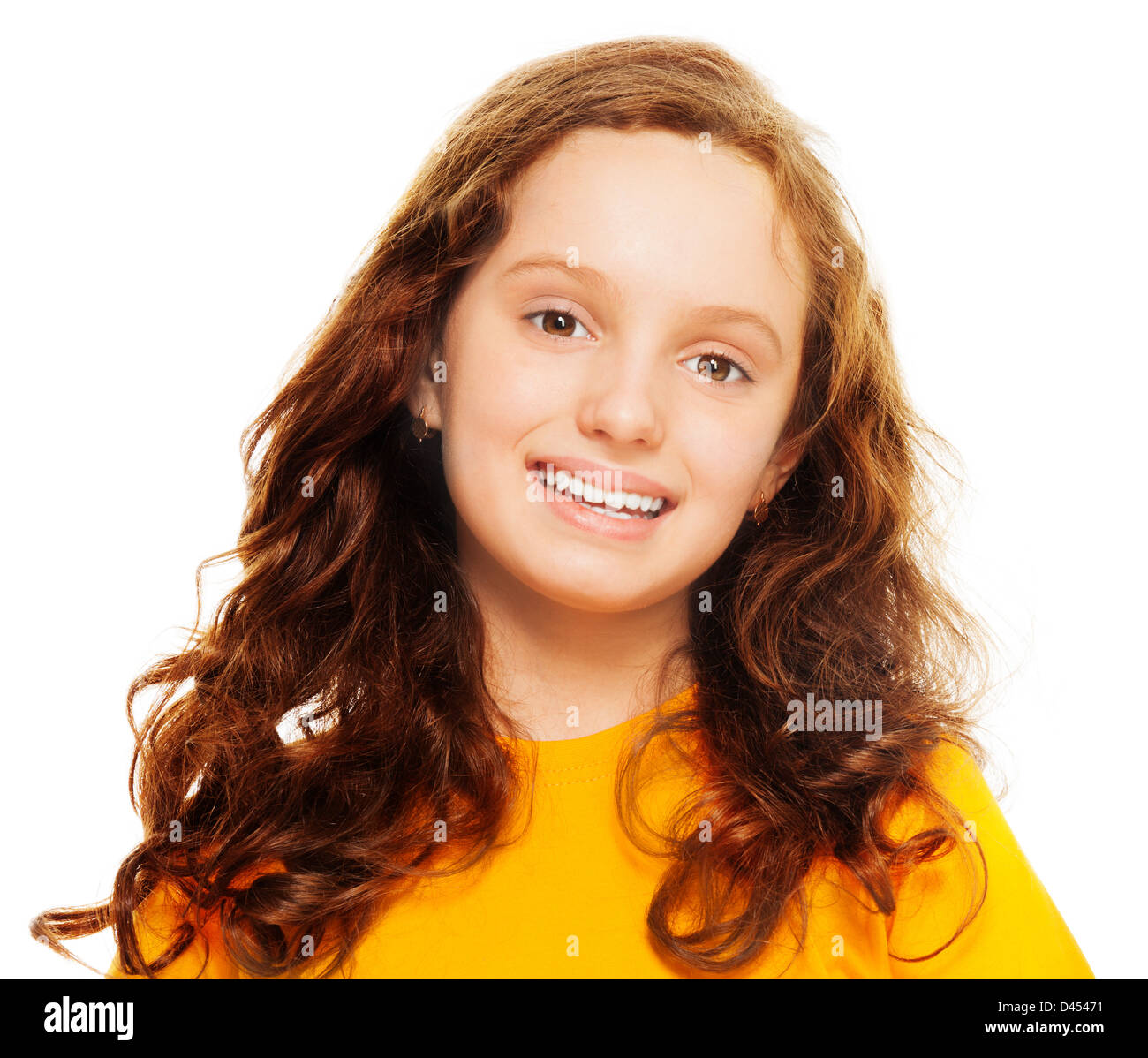 Close-up portrait of curly teen girl with curly hair, laughing with ...