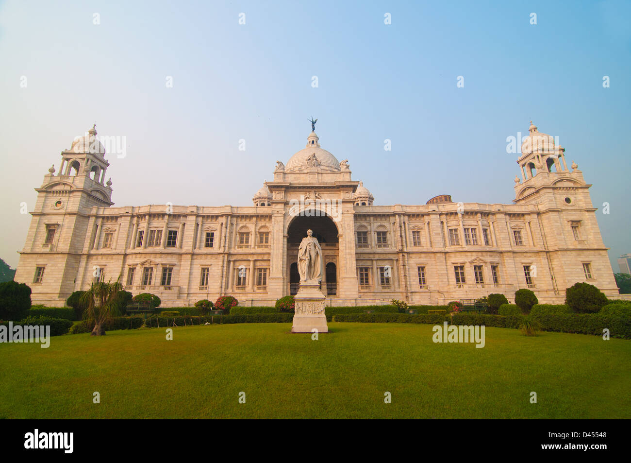Landmark building of Calcutta or Kolkata, Victoria Memorial Hall with Queen's Garden in the front, white Marble and blue sky Stock Photo