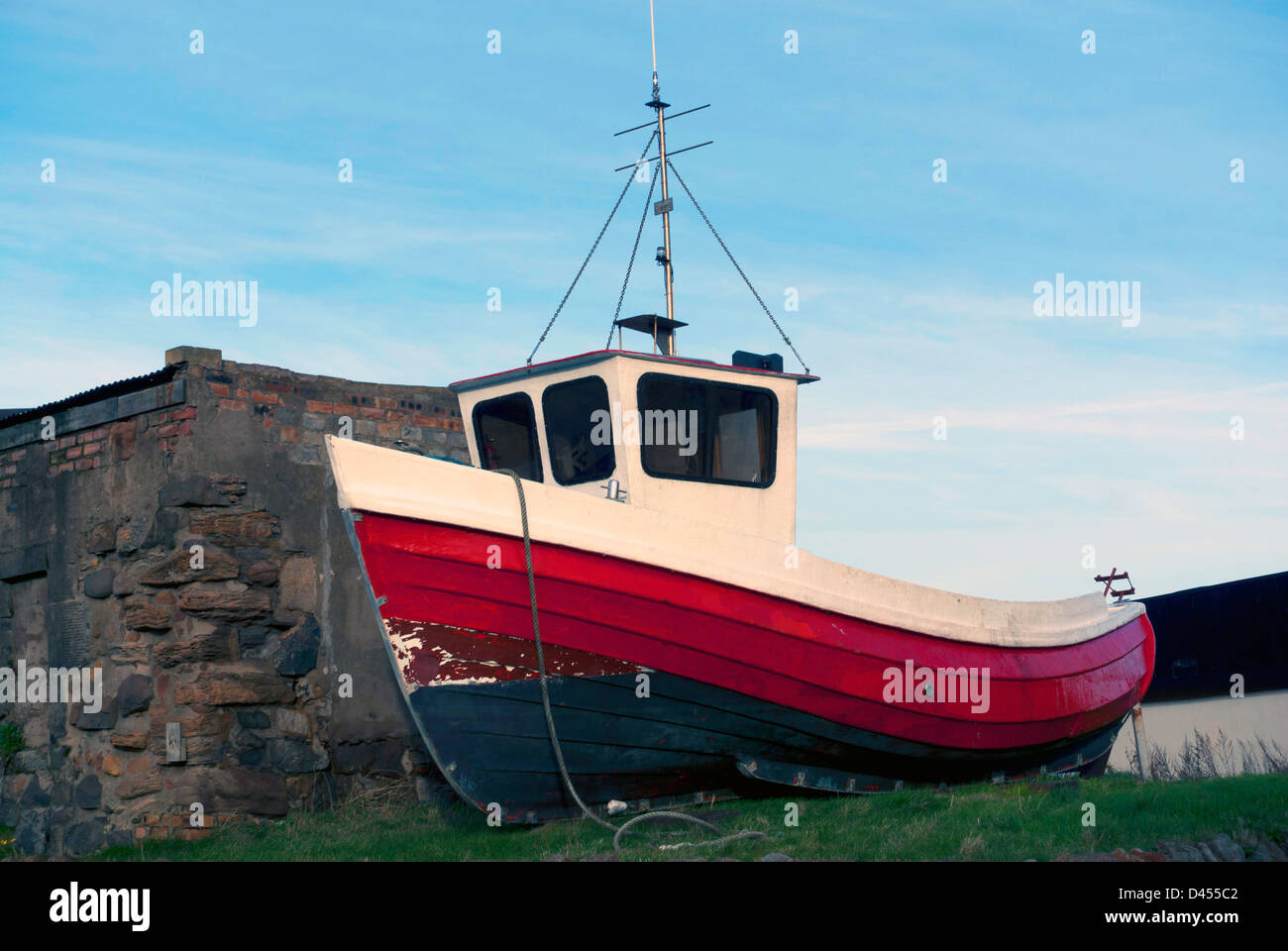 A small fishing boat out of the water at Port Seton, East Lothian, Scotland Stock Photo Alamy