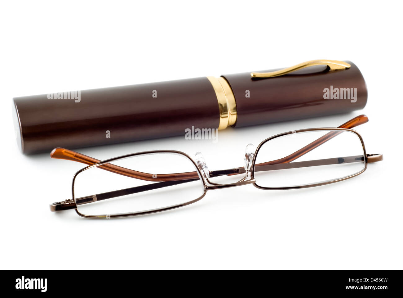 Spectacles and spectacle-case are photographed close-up on the white background Stock Photo