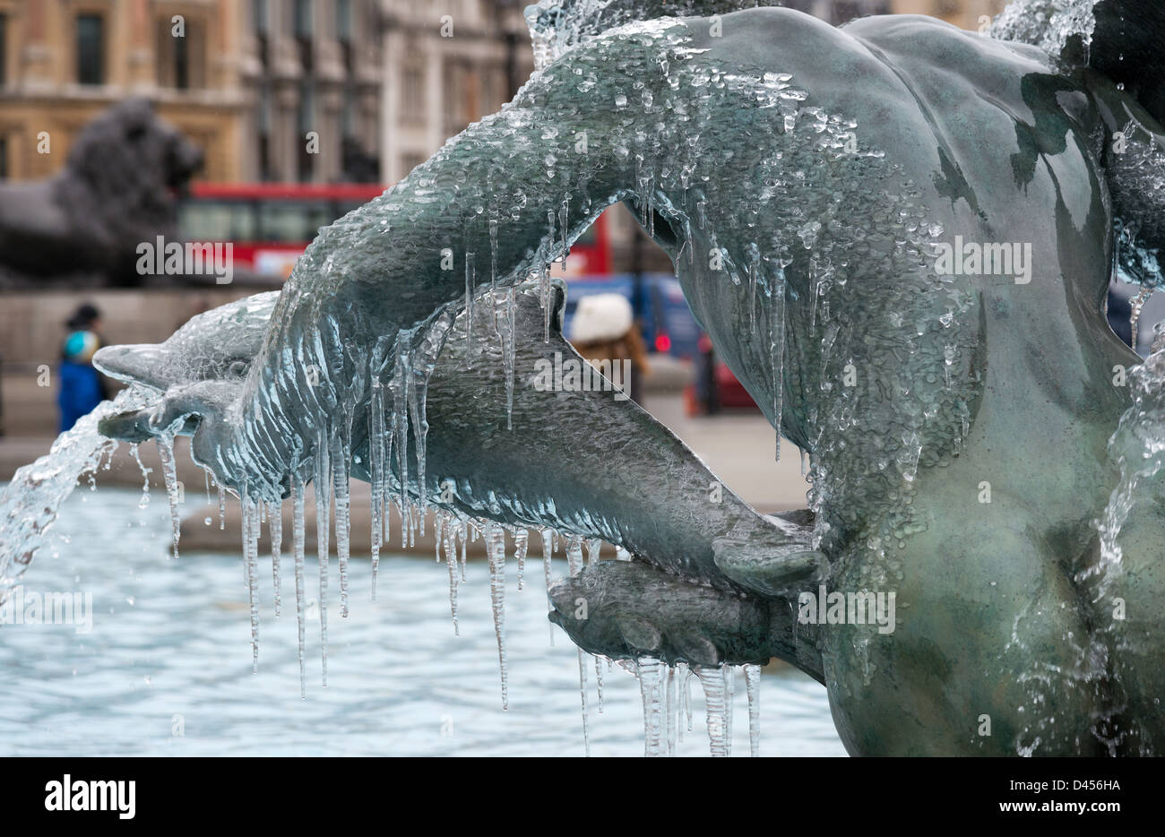 Icicles hanging off a fountain in Trafalgar Square on a freezing cold day in Winter. Stock Photo