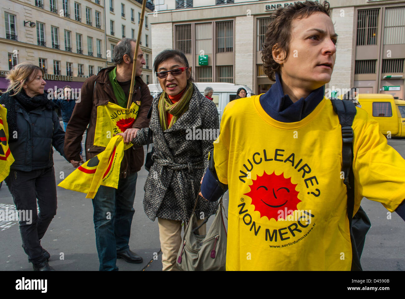 Paris, France. French Anti-Nuclear Power N.G.O. 'Sorton de la Nucleaire' Human Chain Protesting, Fuki-shima Accident Anniversary. Stock Photo