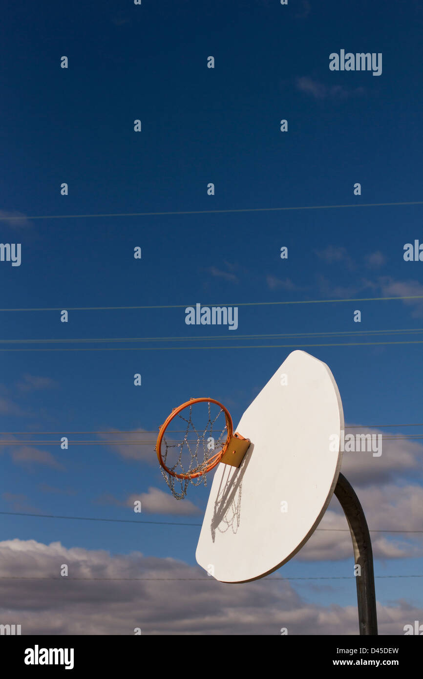 A basketball hoop and backboard has been twisted upside-down from the ...