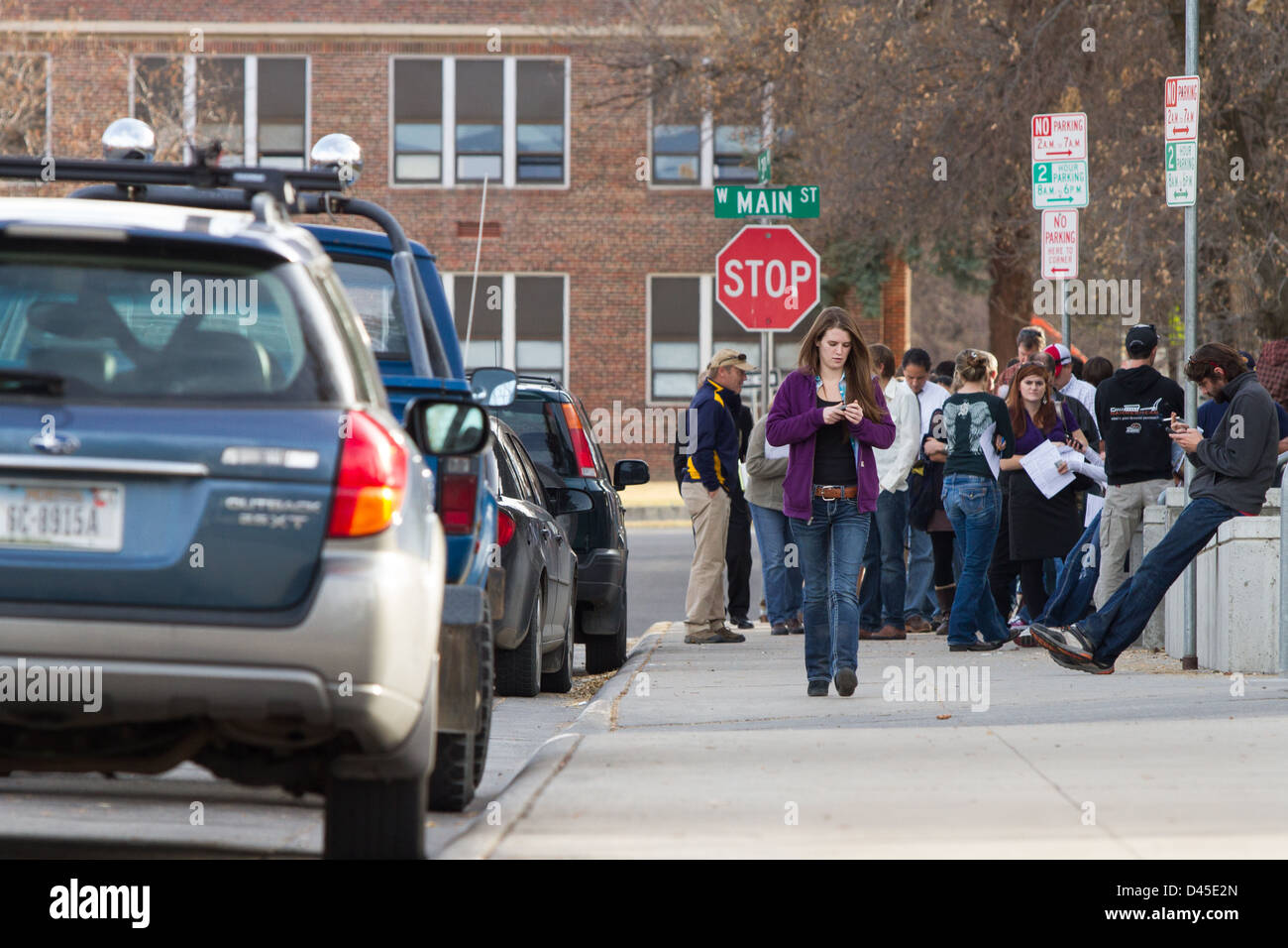 Voters wait outside the the Gallatin County courthouse in Downtown Bozeman Montana to cast their votes. Stock Photo
