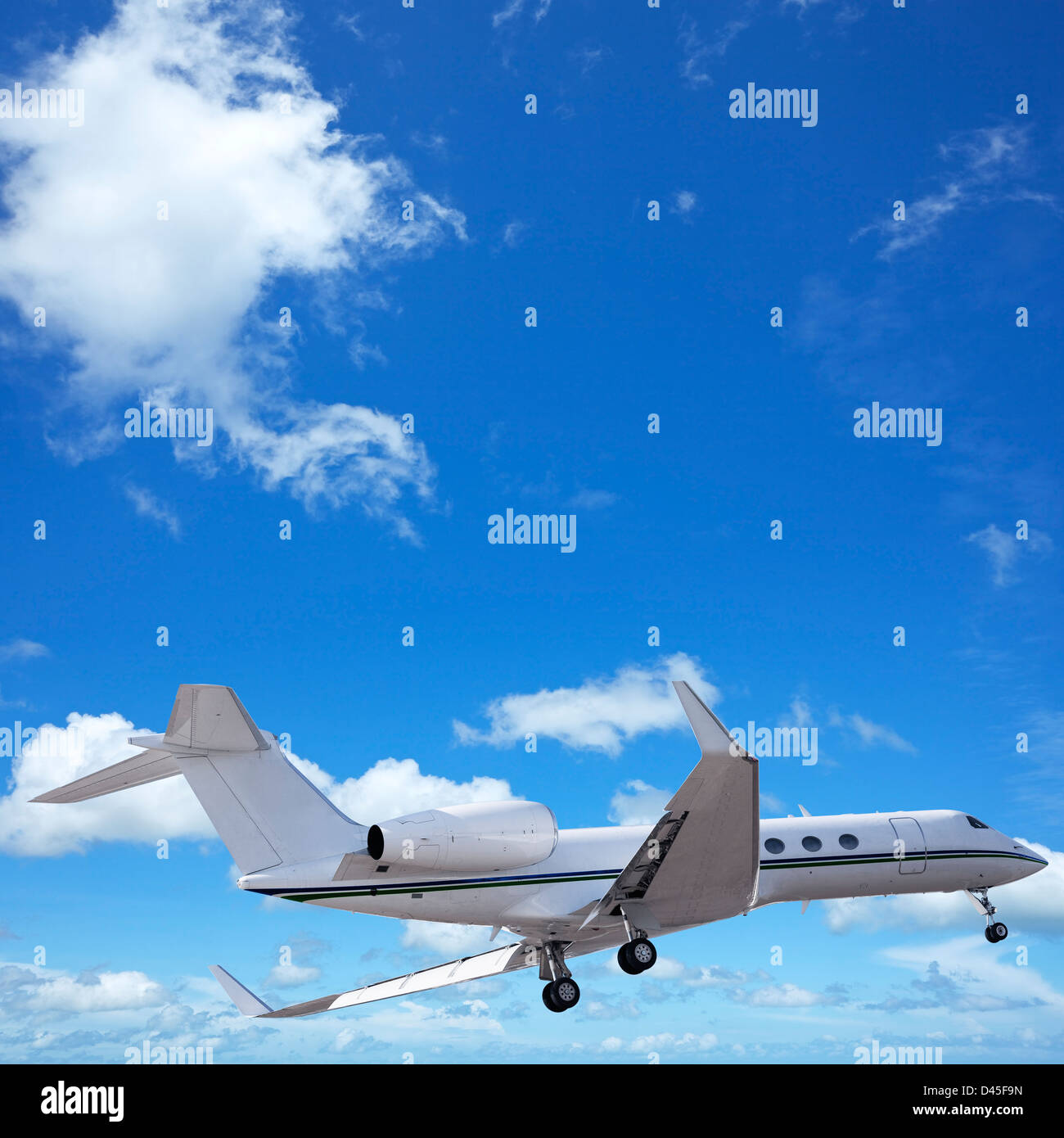 Private jet in a sky. Square composition. Stock Photo