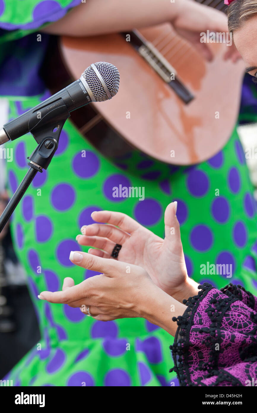 Flamenco singing accompanied by Spanish guitar and clapping. Stock Photo