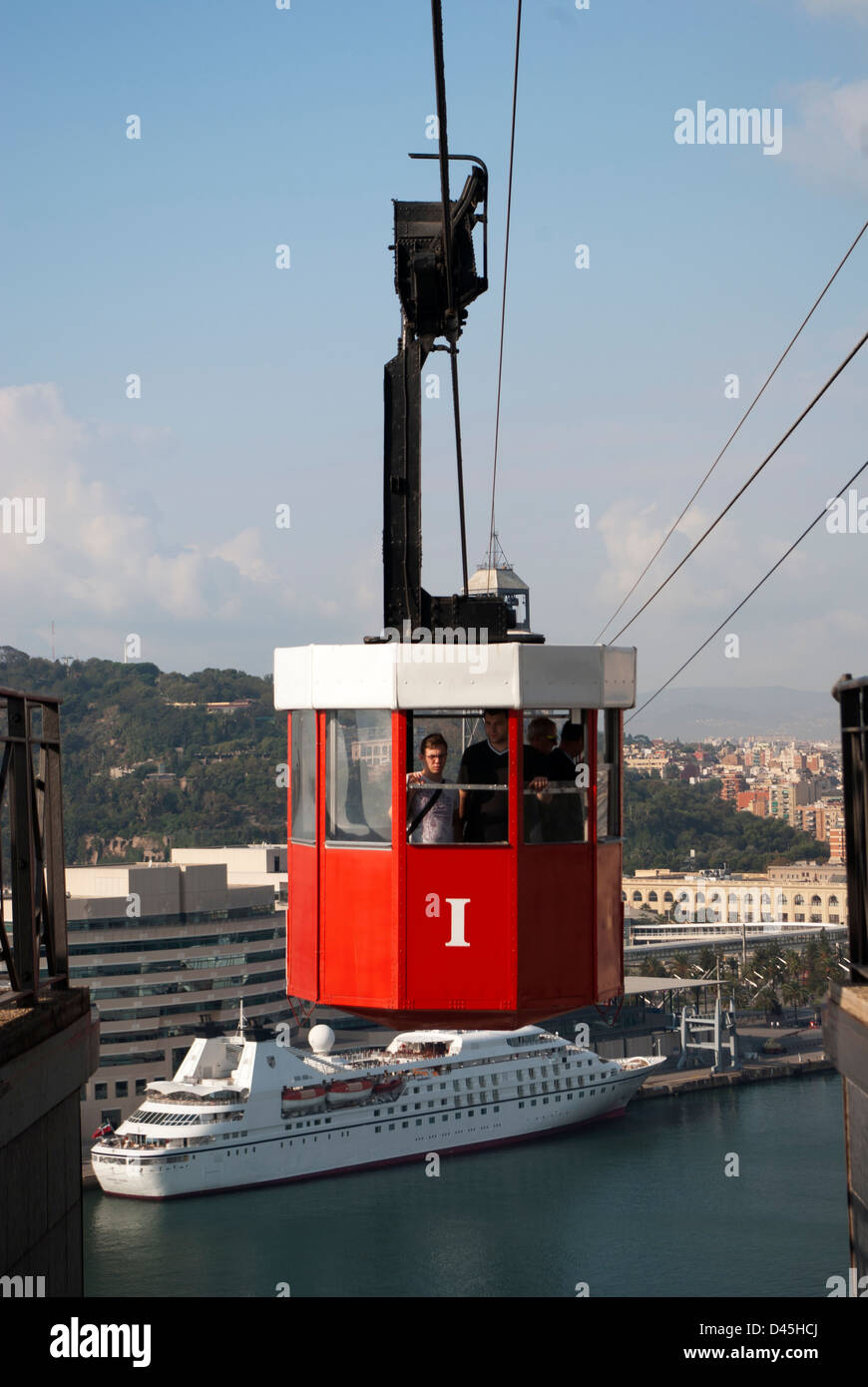 Aerial tram arrives from World Trade center to Torre (Tower) de St. Sebastia. Stock Photo