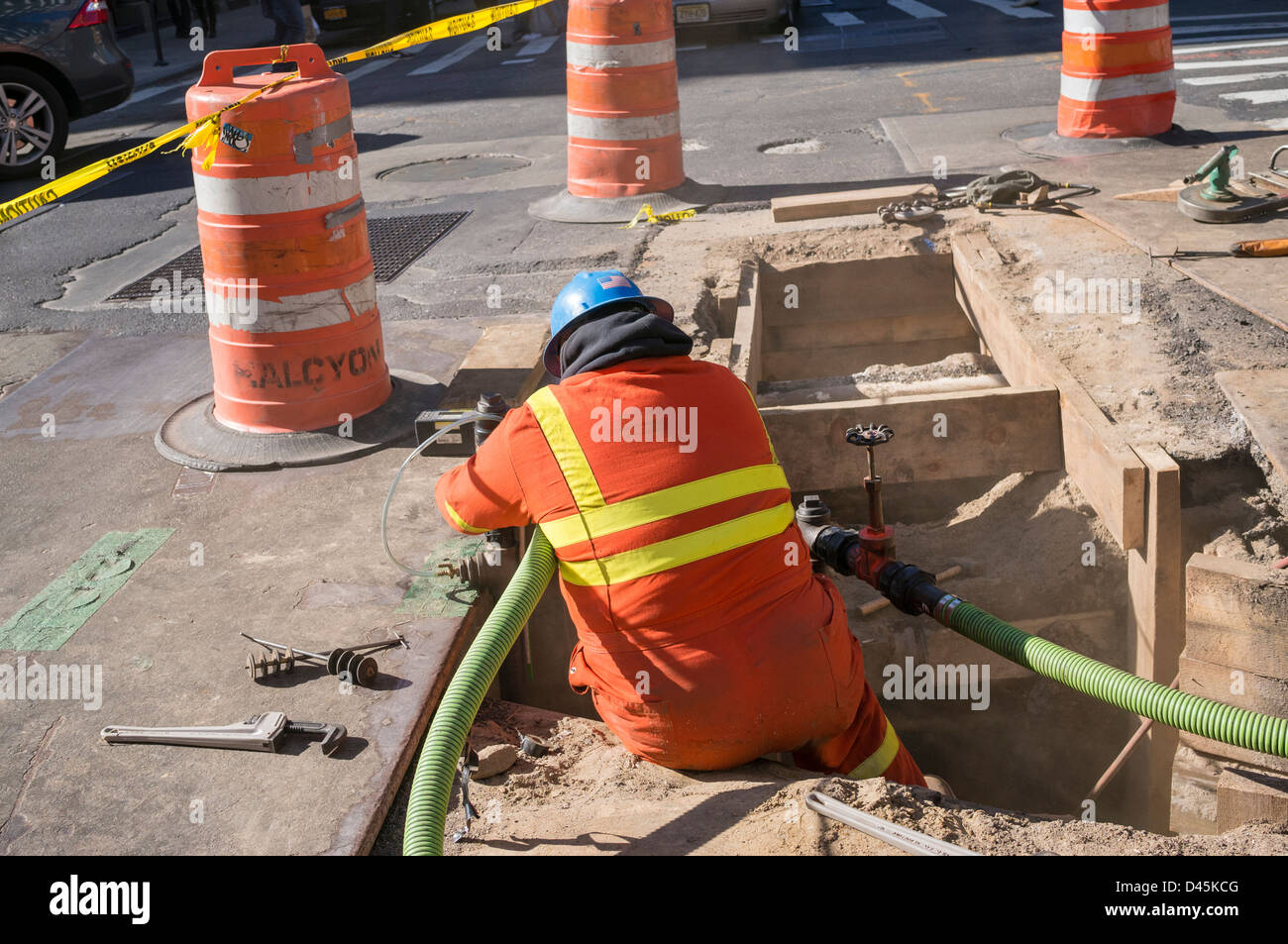 Construction worker in New York City helping replaces the infrastructure for gas, electric and water for the DDC NYC Stock Photo