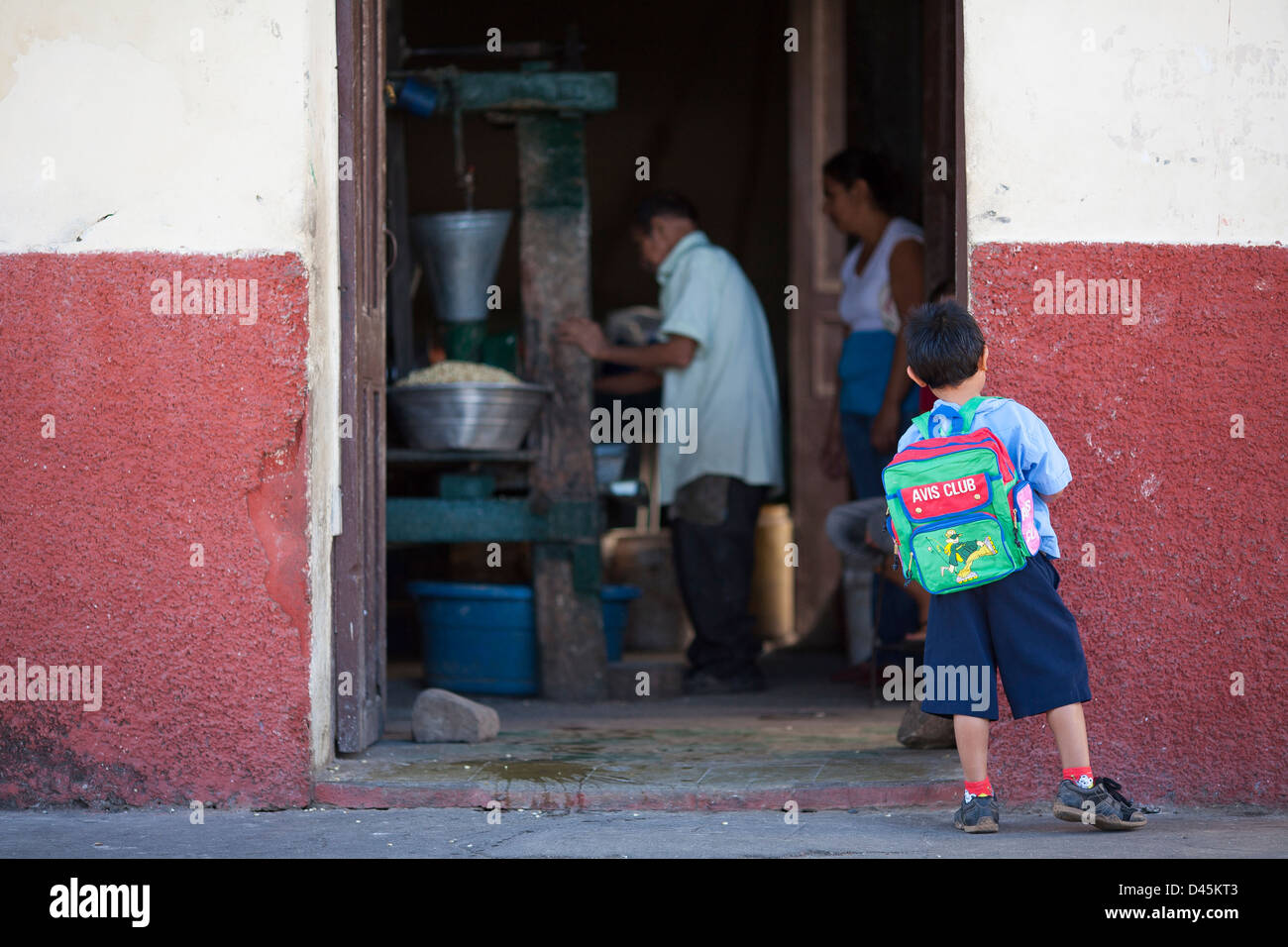 Barefoot girl striding past the Sitio del Niño train station in rural El  Salvador, Central America Stock Photo - Alamy