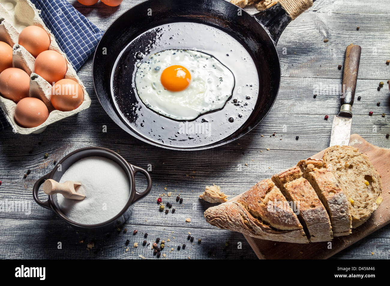 Fresh bread and fried egg for breakfast Stock Photo - Alamy