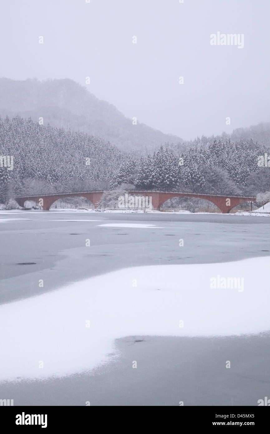 Frozen Lake Usui and bridge in winter, Gunma, Japan Stock Photo