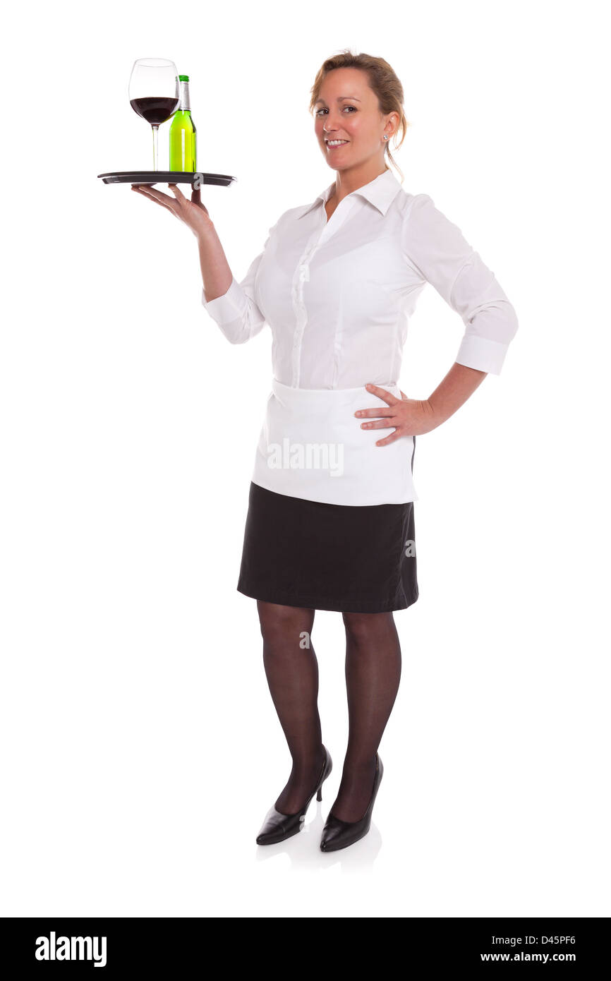 Full length photo of a waitress serving drinks on a tray, isolated on a white background. Stock Photo