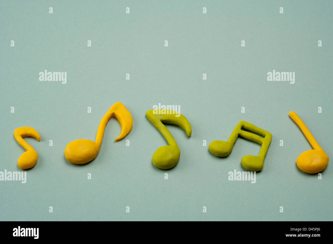 musical notes made in clay Stock Photo Alamy