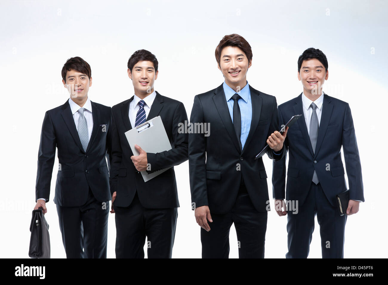 close up shot of businessmen in business suit walking together Stock ...