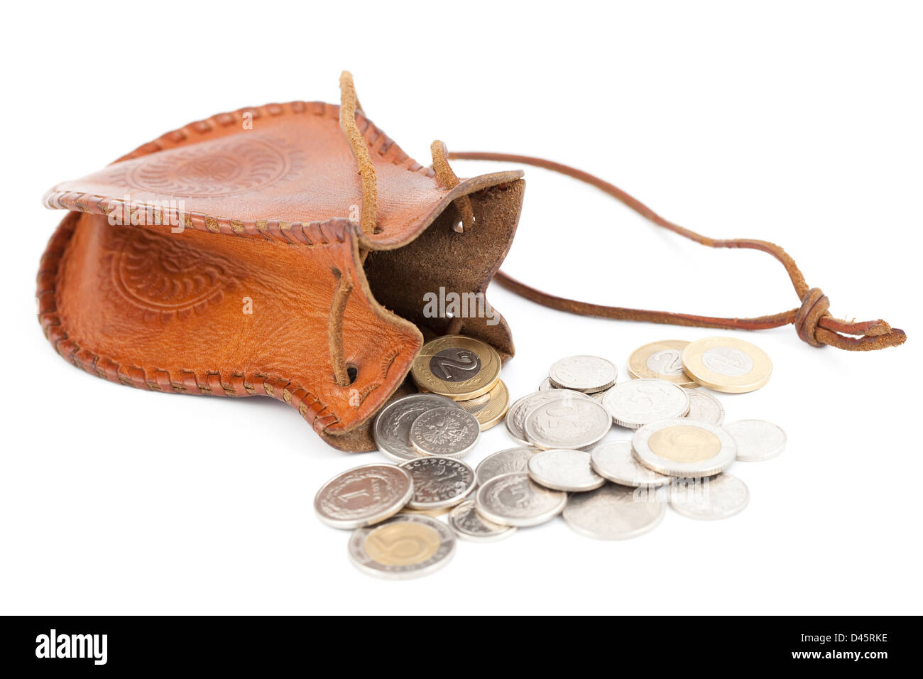 spilled coins with money-bag on white background Stock Photo