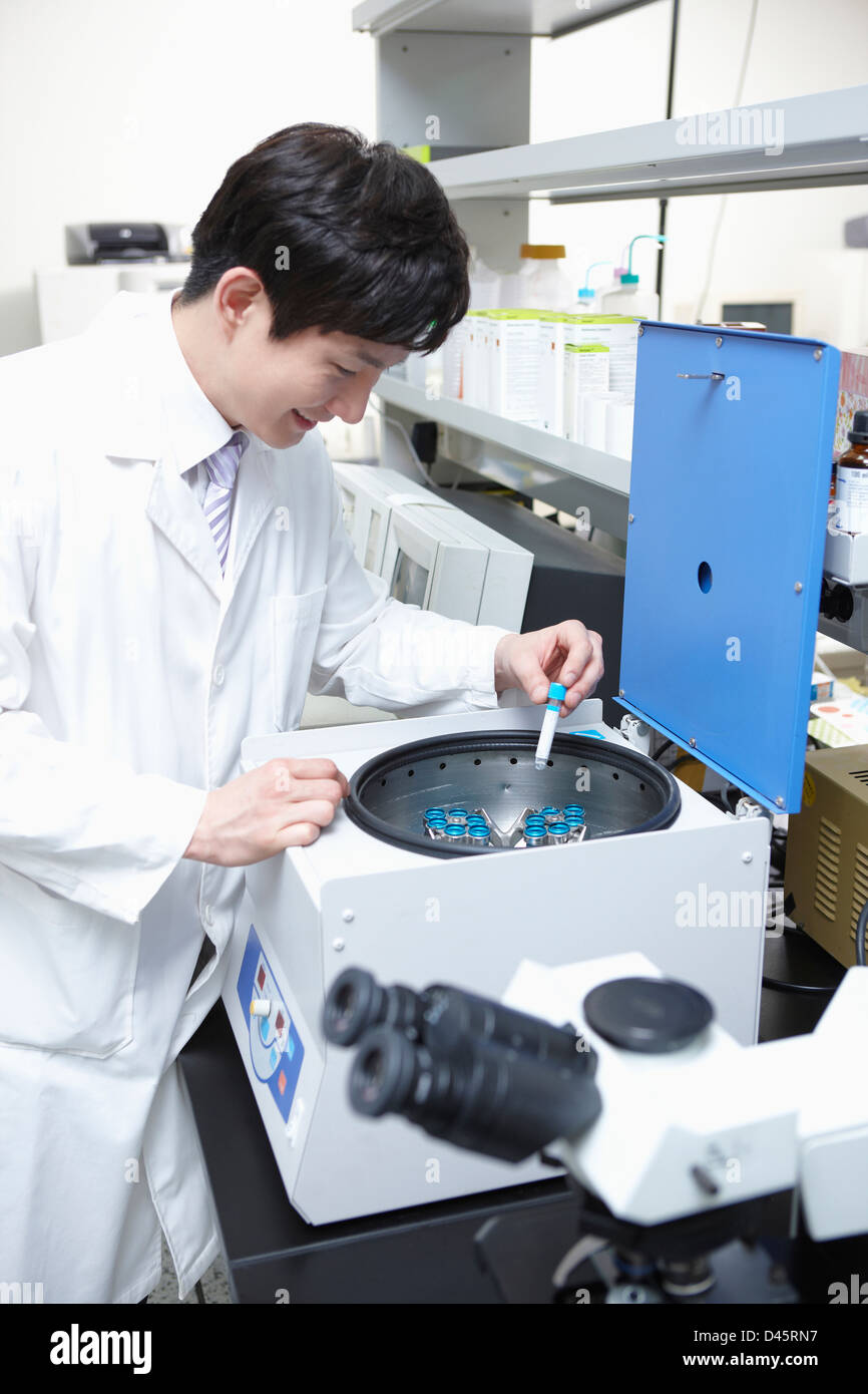 a doctor putting sample case into a box Stock Photo Alamy