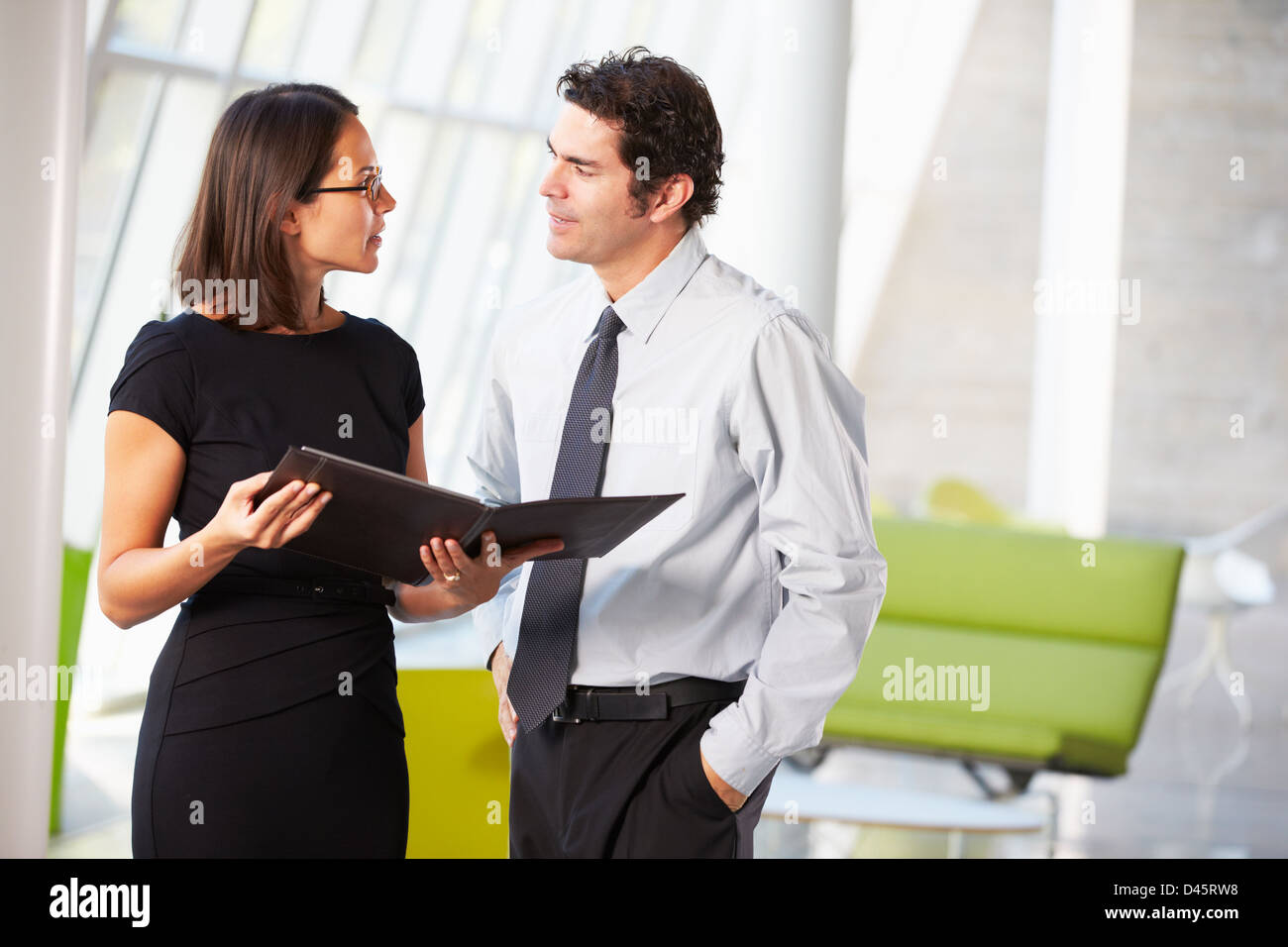 Businessman And Businesswomen Having Meeting In Office Stock Photo - Alamy