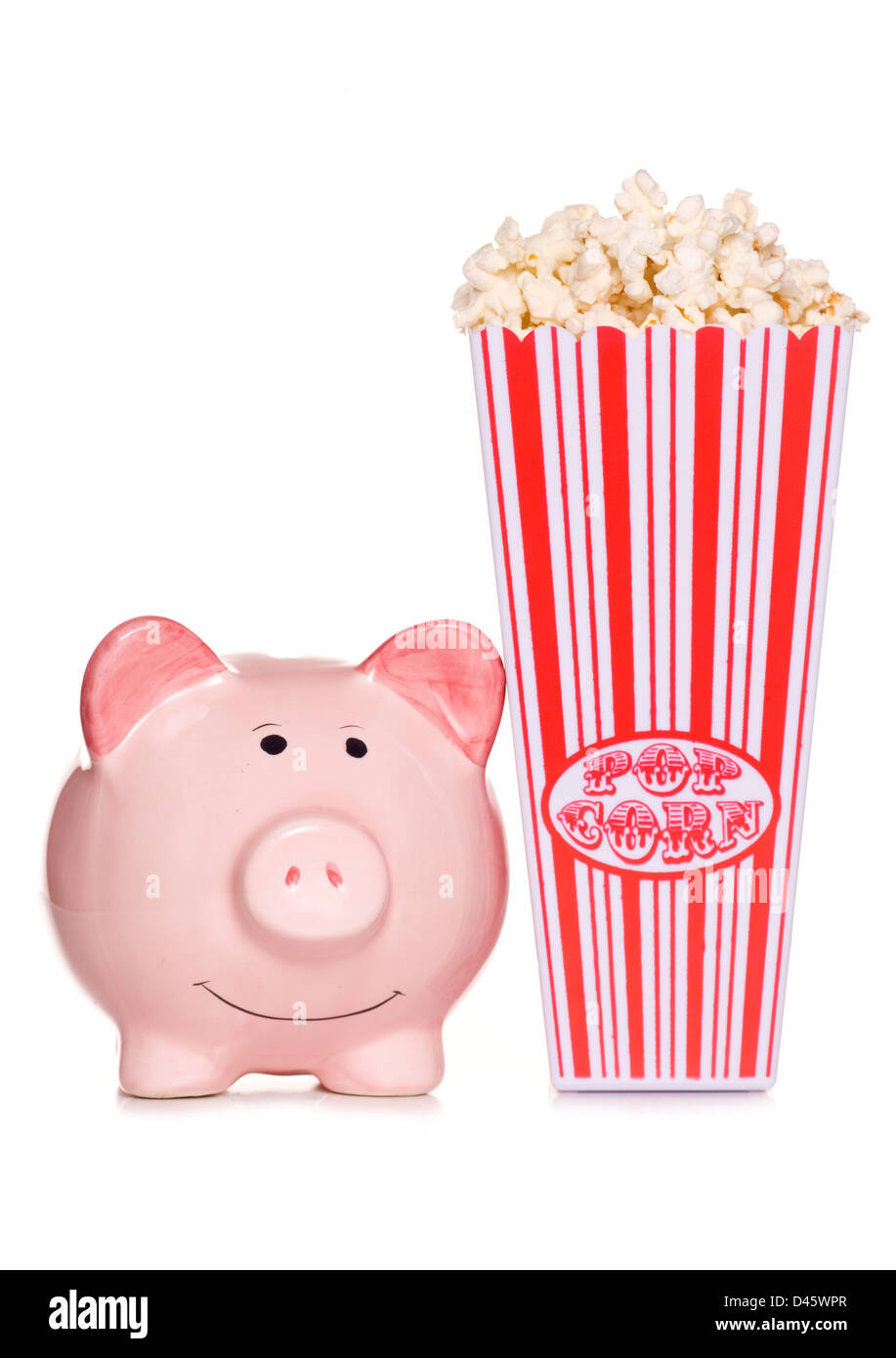 piggy bank with retro popcorn studio cutout Stock Photo
