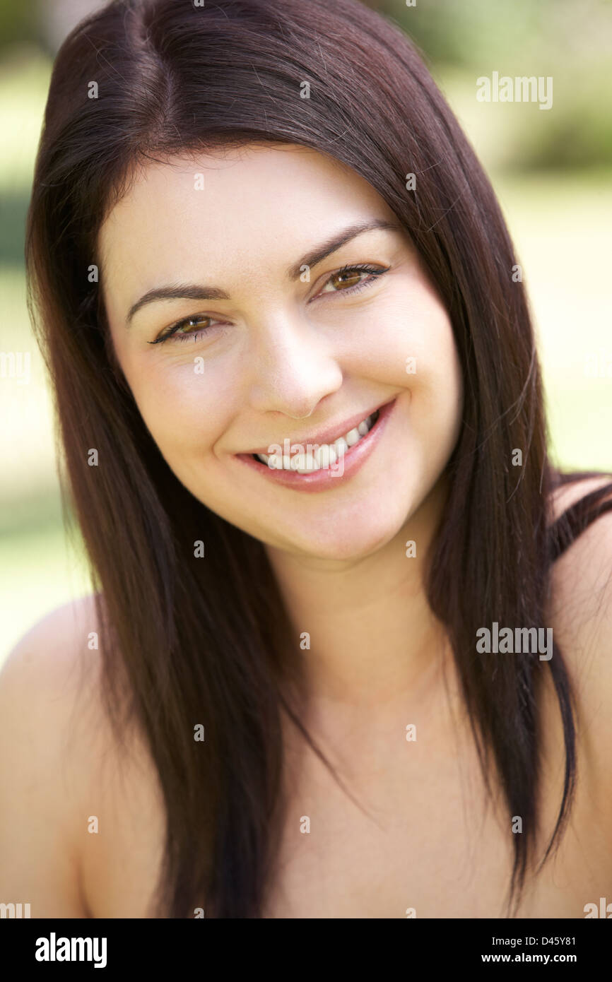 Outdoor Portrait Of Smiling Woman Stock Photo