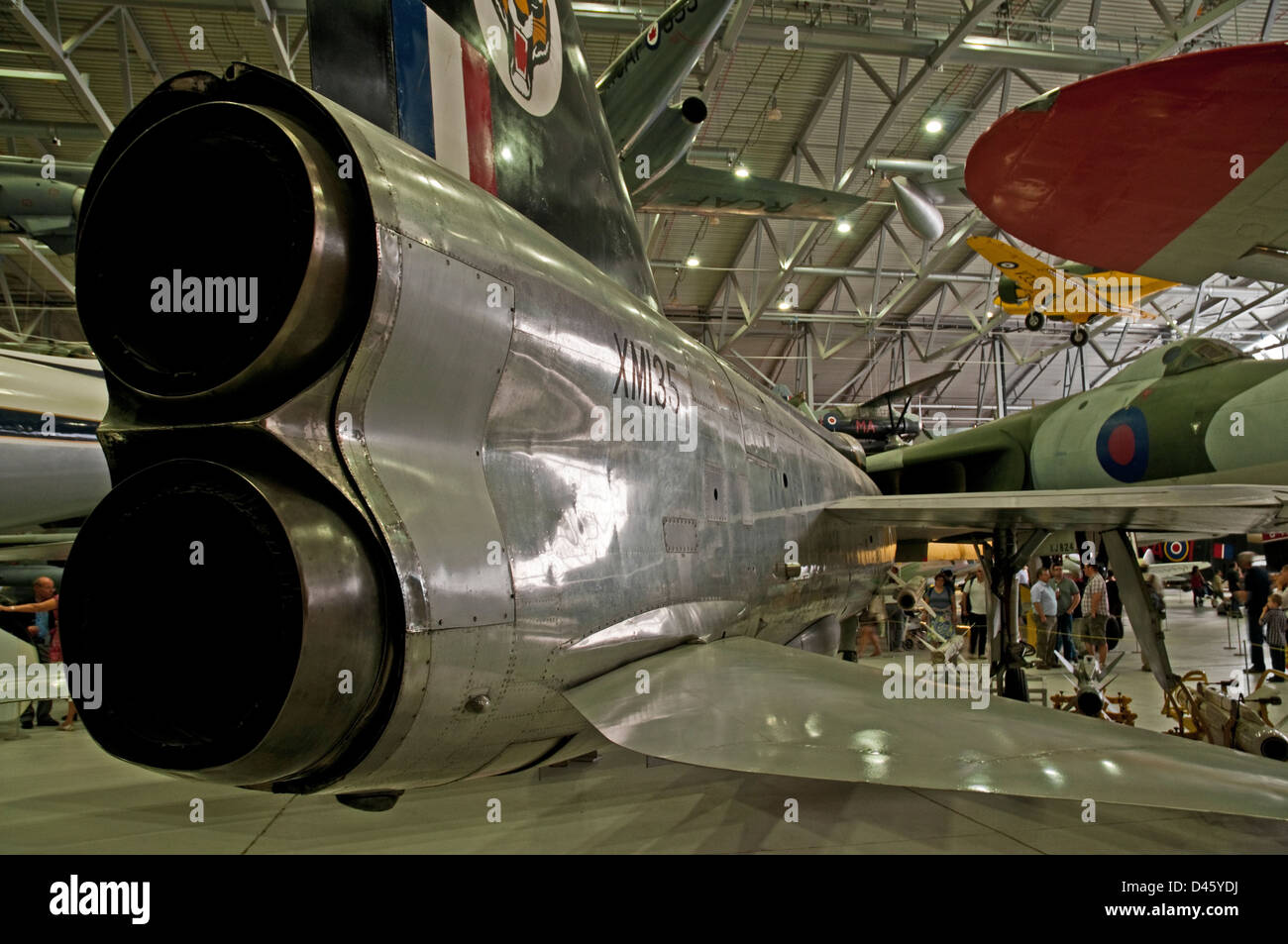Closeup image of the rear of a jet fighter plane on display in an