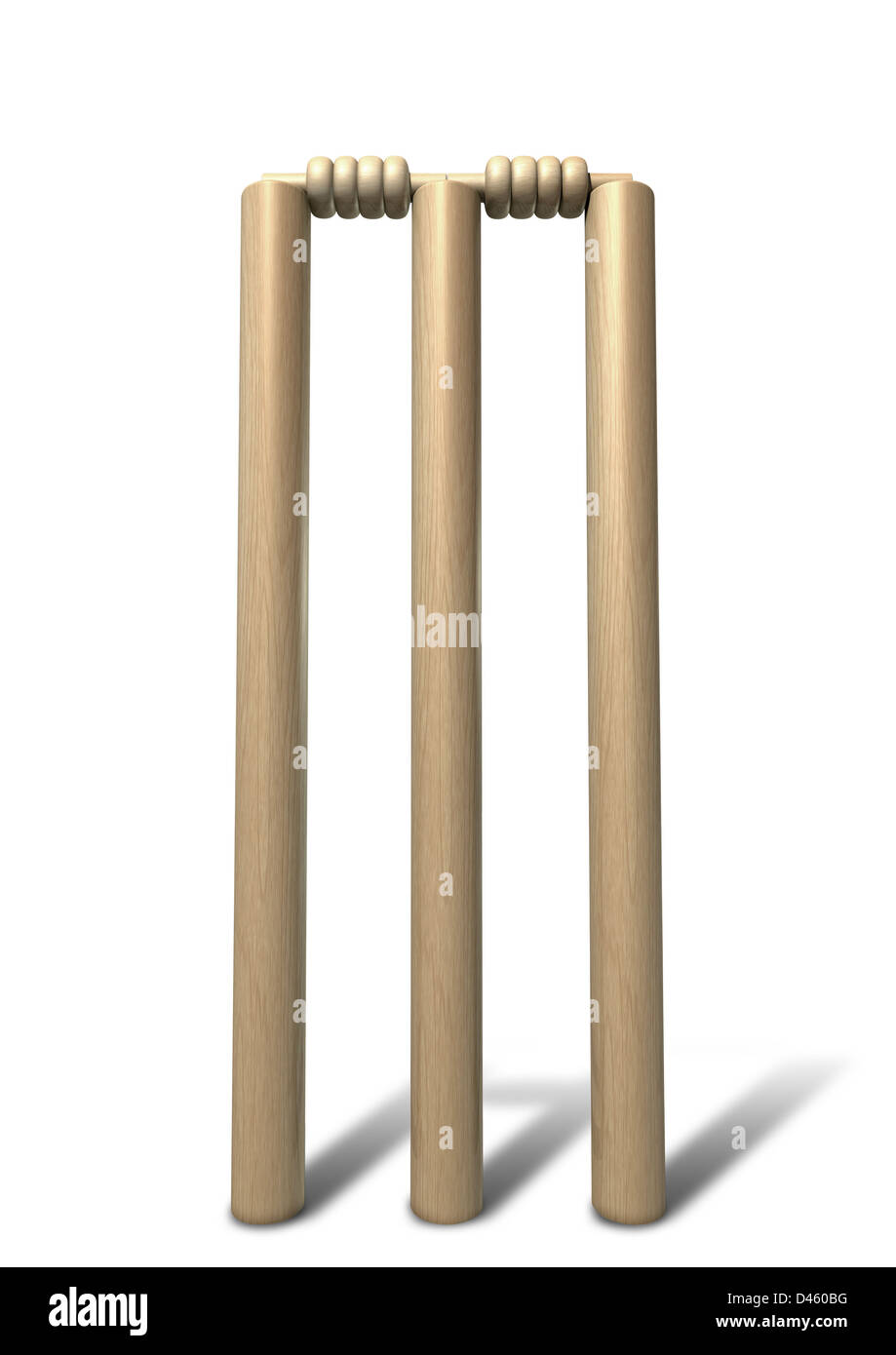 A set of regular wooden cricket wickets and bails on an isolated background Stock Photo