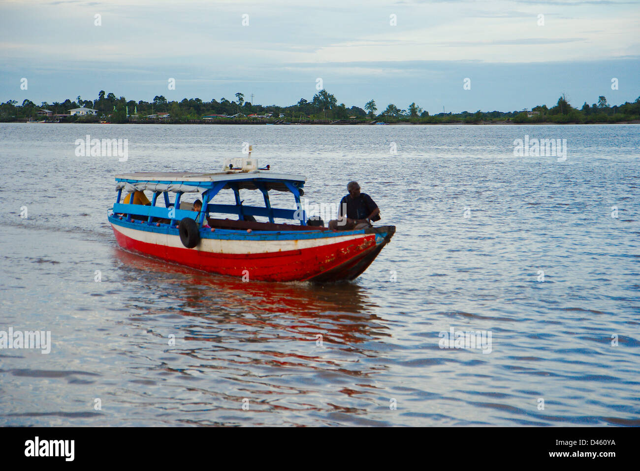 Small ferry boat with people crossing the Surinam River Stock Photo - Alamy