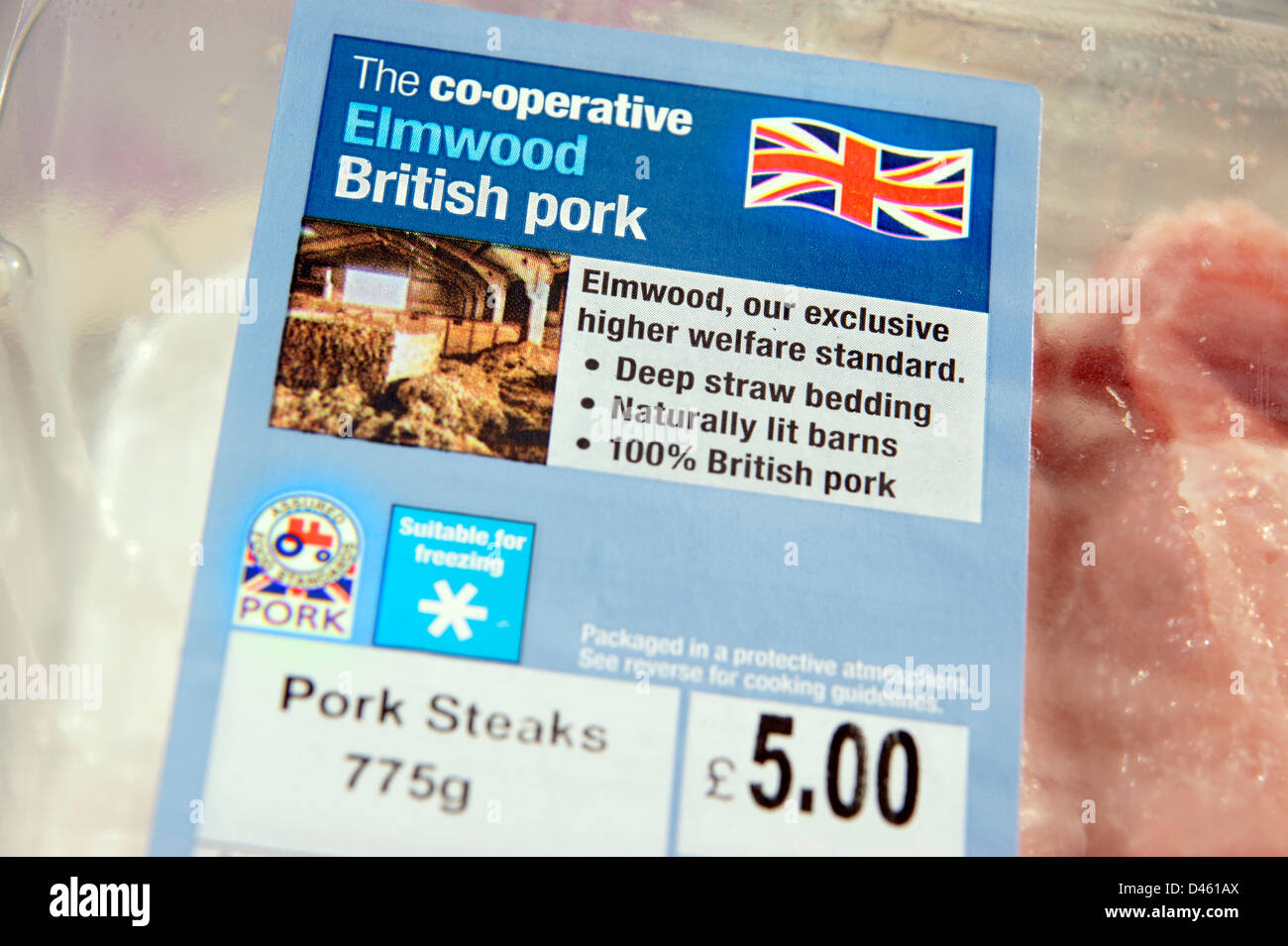 Co-operative Elmwood British Pork steaks / cutlets sourced from high standard farms with signs / logos of British farm standard Stock Photo