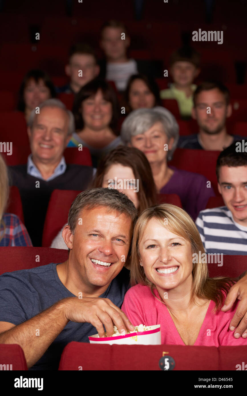 Couple Watching Film In Cinema Stock Photo