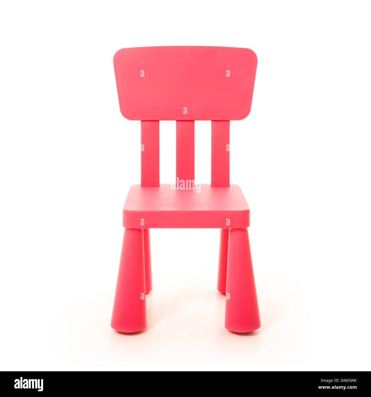 child's pink plastic chair on white background Stock Photo Alamy