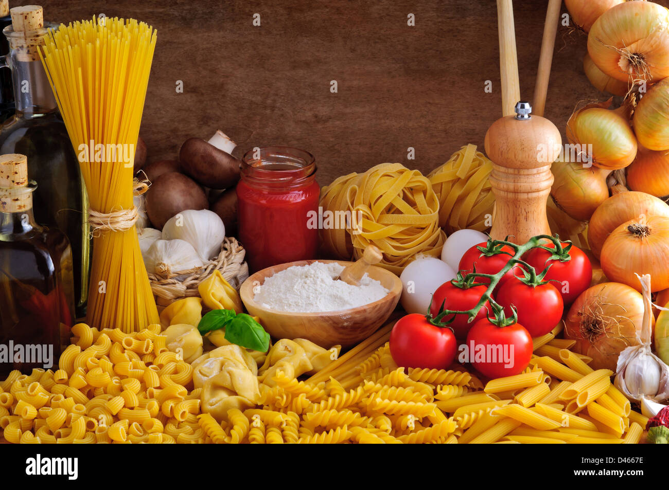 Still life with traditional italian pasta and ingredients Stock Photo