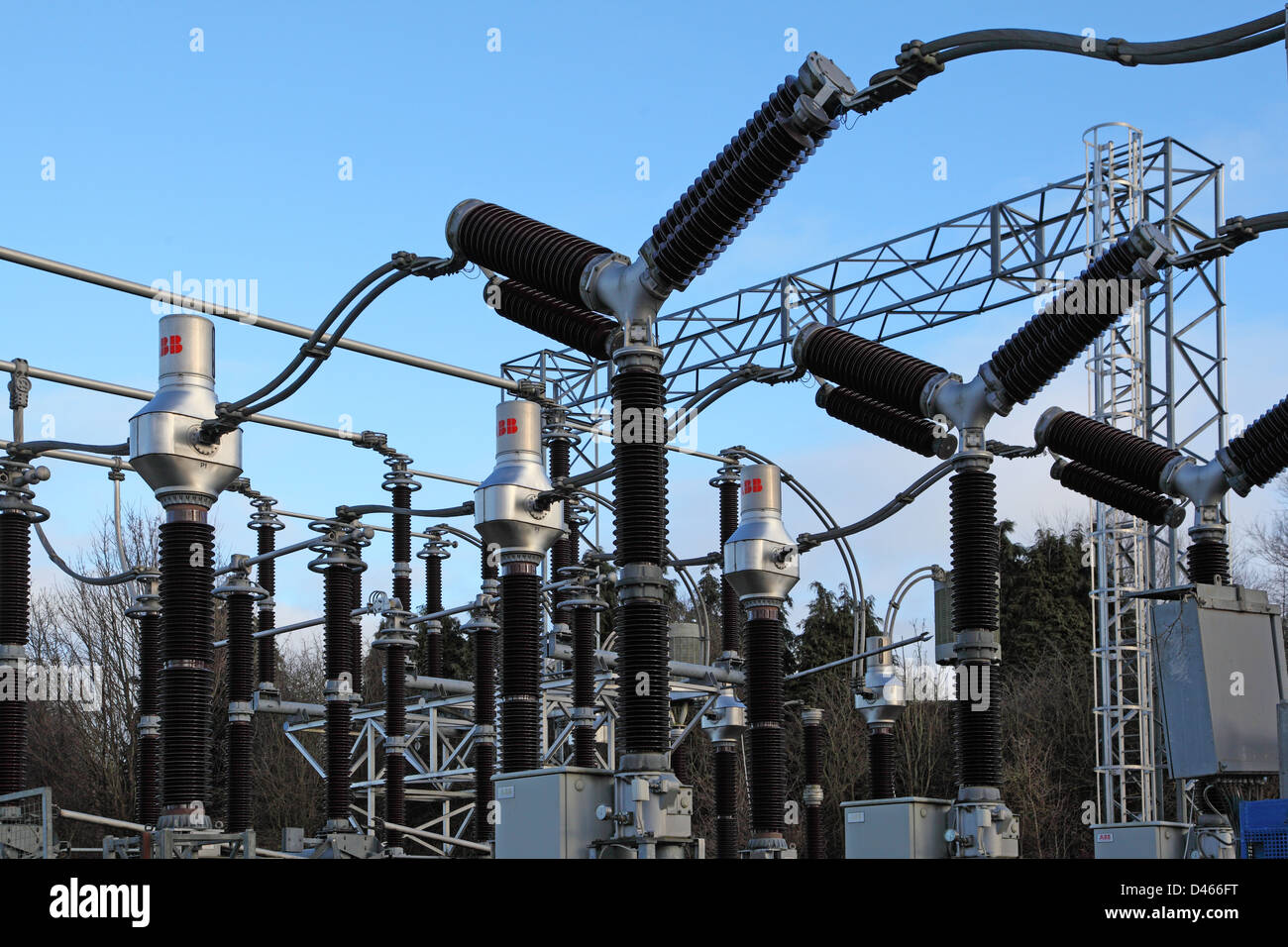 Electricity sub-station at Knaresborough, Yorkshire, UK. Shows high-voltage connectors and ceramic insulators. Stock Photo