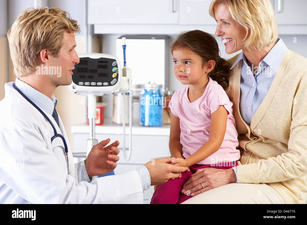 Mother And Child Visiting Doctor's Office Stock Photo - Alamy