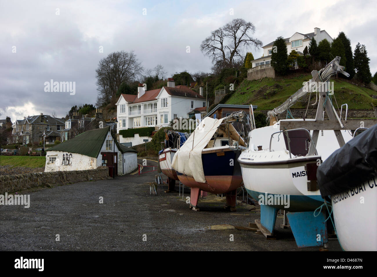 Boats overwintering on the pier at Aberdour Stock Photo