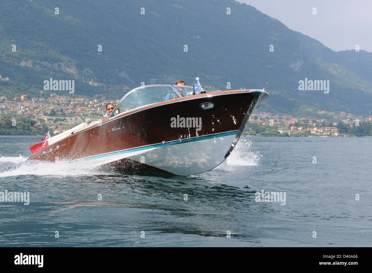 Riva Classic boat, Lake Como, Italy, July 2009. Classic Riva Ariston motorboat crossing Lake Como,in the Italian Lakes. Stock Photo