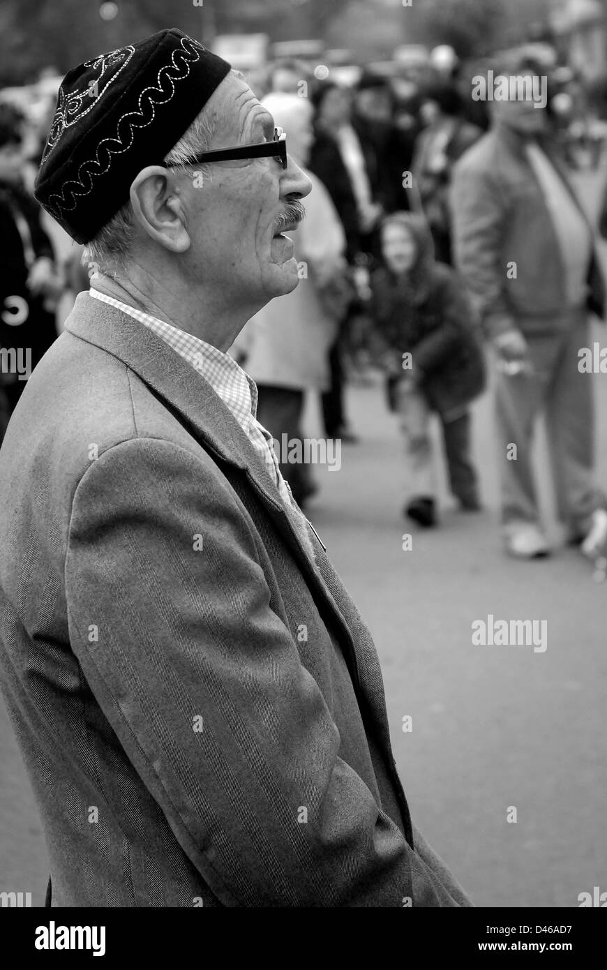 Elderly Kazakh man in Old Square, Almaty, Kazakhstan Stock Photo