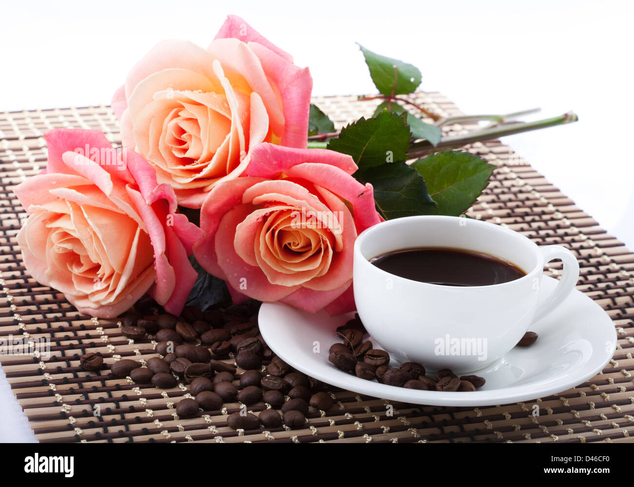 Flowers, cup of coffee and rose Close up on the fabric background Stock  Photo - Alamy