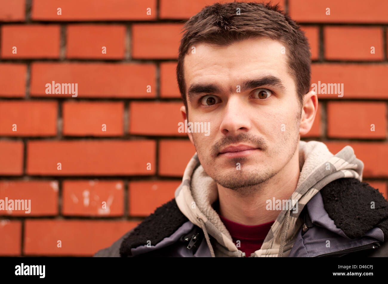 Shocked young man Stock Photo