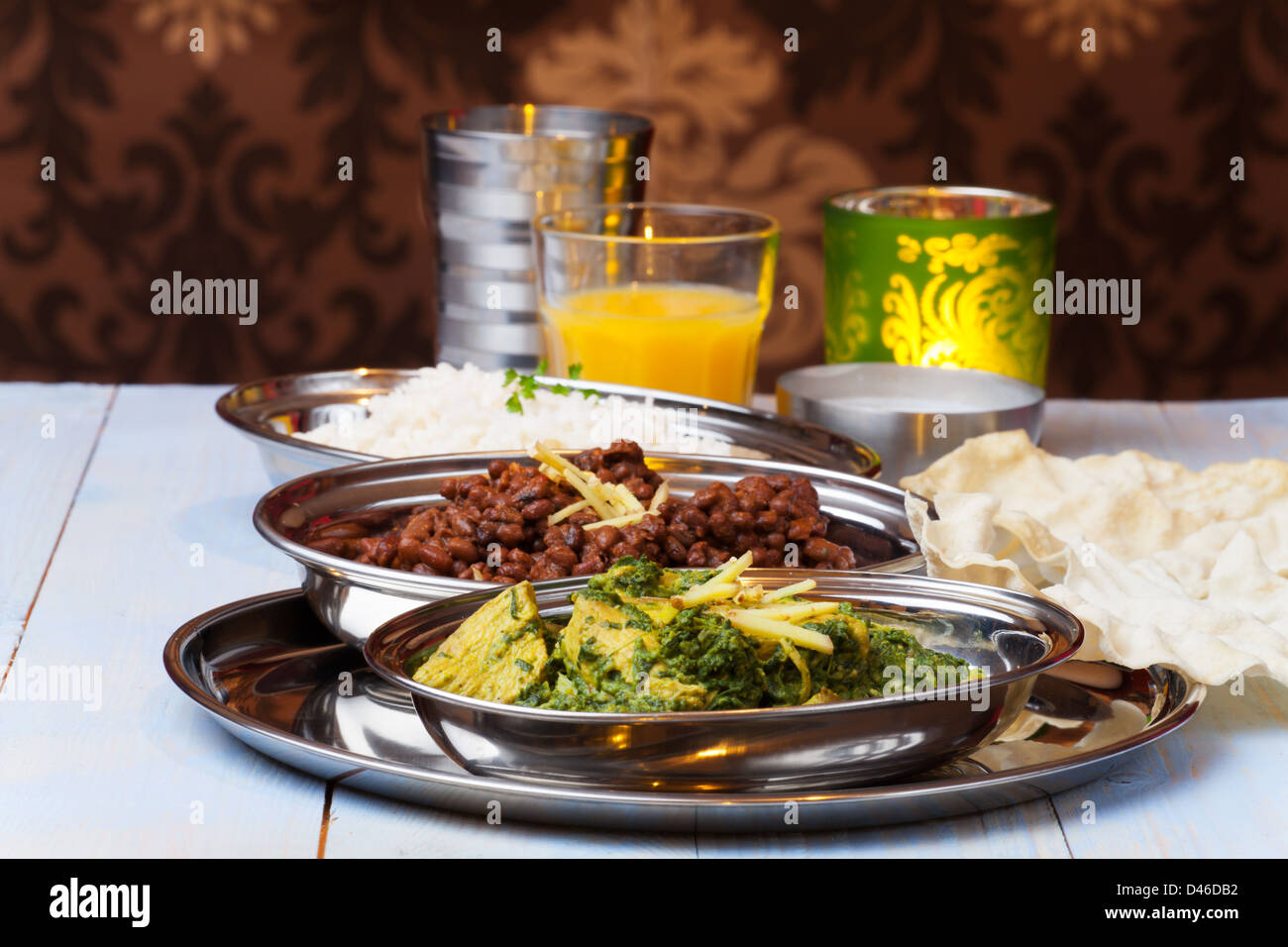 indian murgh palak and dhal with rice Stock Photo