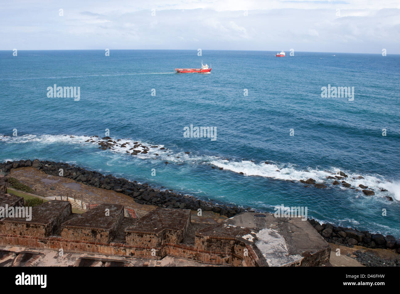 Tanker and Fishing  Boat off the Point of El Morro, San Juan Stock Photo