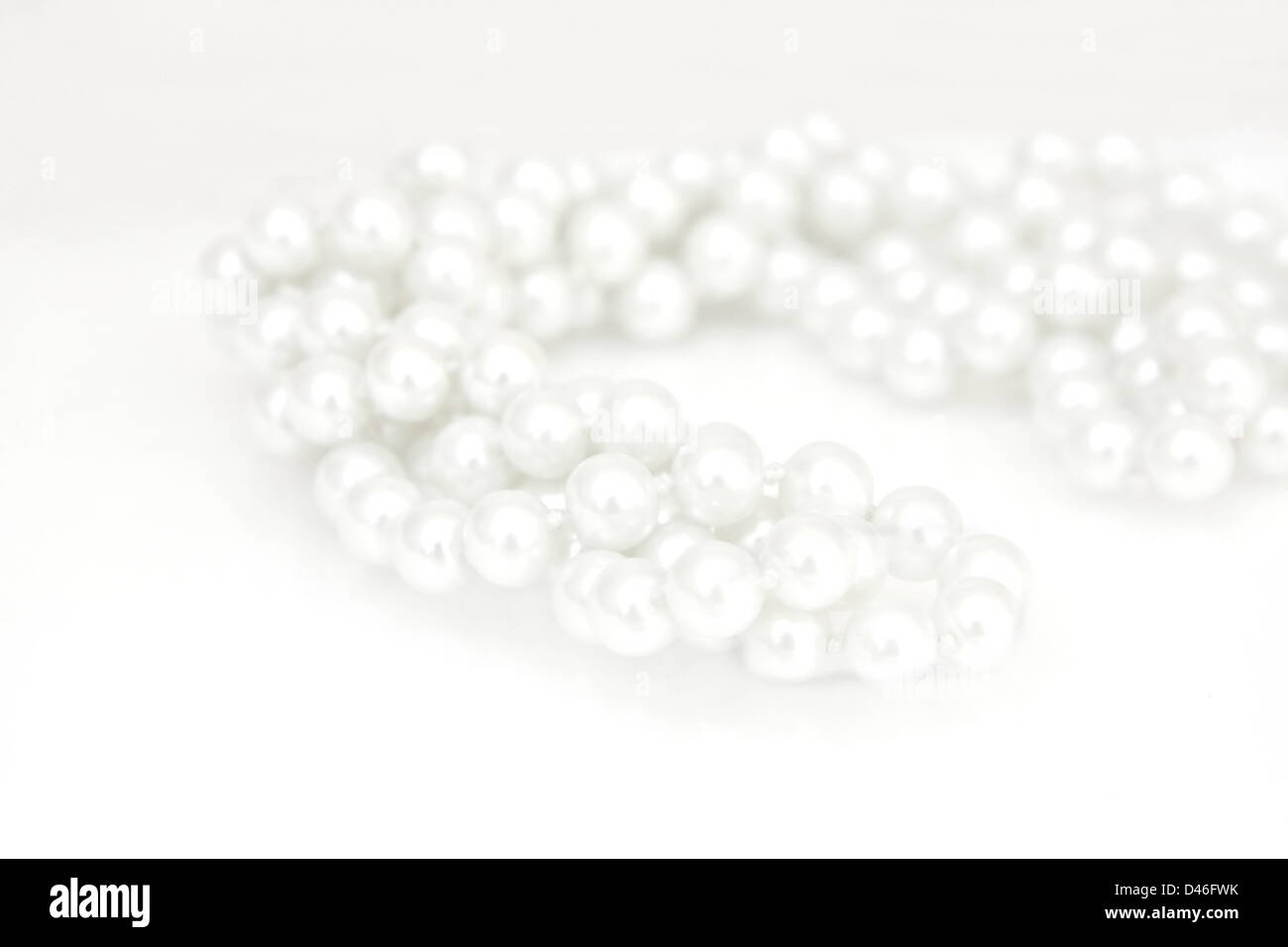 a string of fake pearls Stock Photo - Alamy