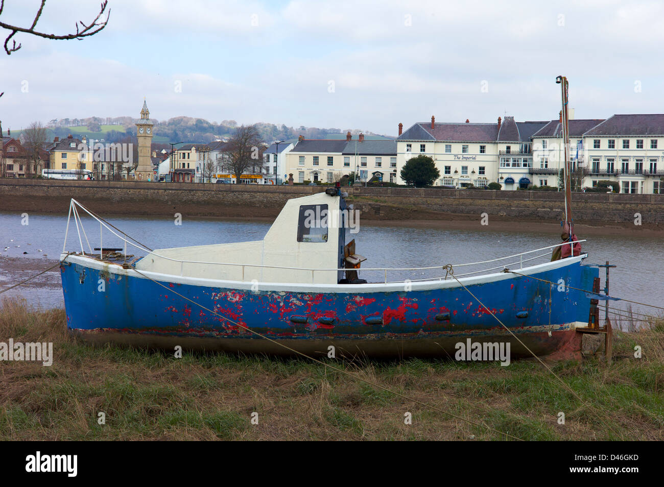 Boat on dry land by River Taw, Barnstaple, Devon, UK Stock Photo