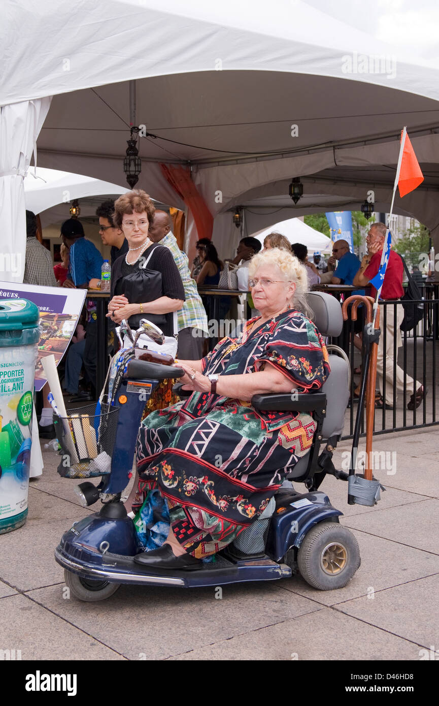 Women on a mobility scooter hi-res stock photography and images - Alamy