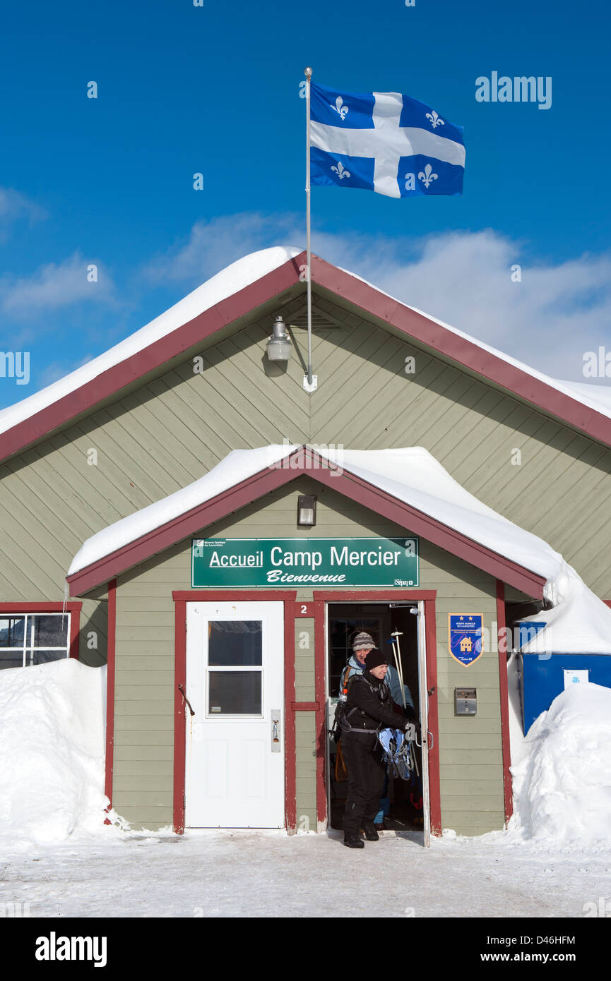 Skiers coming out of the center at Camp Mercier, province of