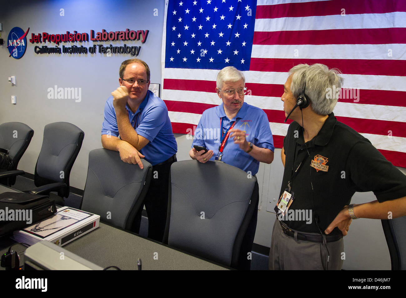 The Mars Science Laboratory mission at JPL, California, features the Curiosity rover conducting surface exploration on Mars. Scientists including Peter Theisinger and Richard Cook oversee mission operations and data collection. Stock Photo