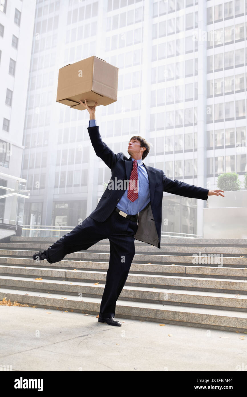 Unemployed Box a wall street man doing a dance with his