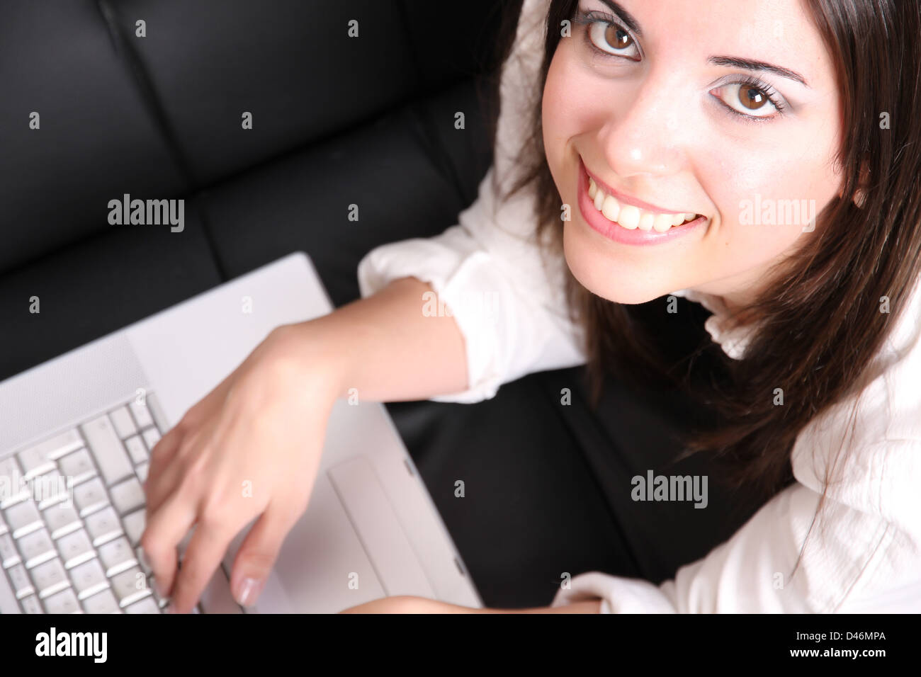 A young woman surfing on the Internet with a Laptop Stock Photo - Alamy